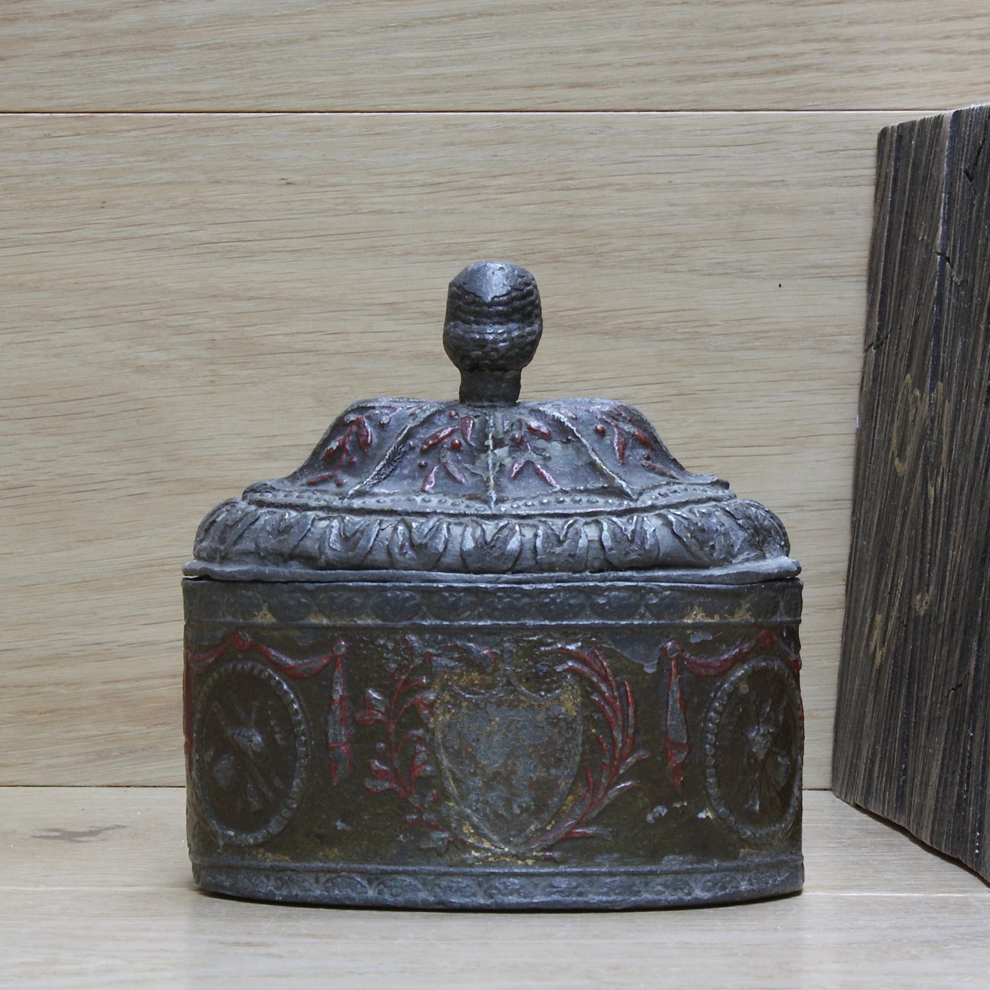 
                  
                    a highly decorated large antique Georgian tobacco box.
                  
                