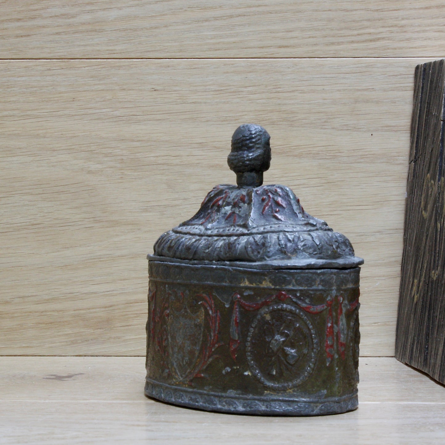 
                  
                    a highly decorated large antique Georgian tobacco box.
                  
                