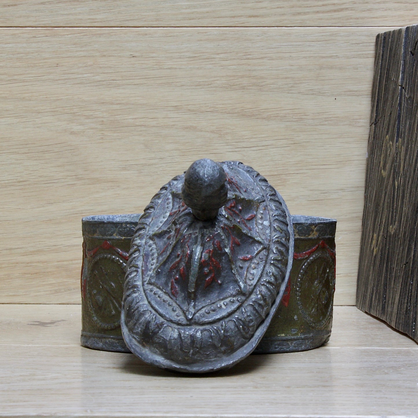 
                  
                    a highly decorated large antique Georgian tobacco box.
                  
                