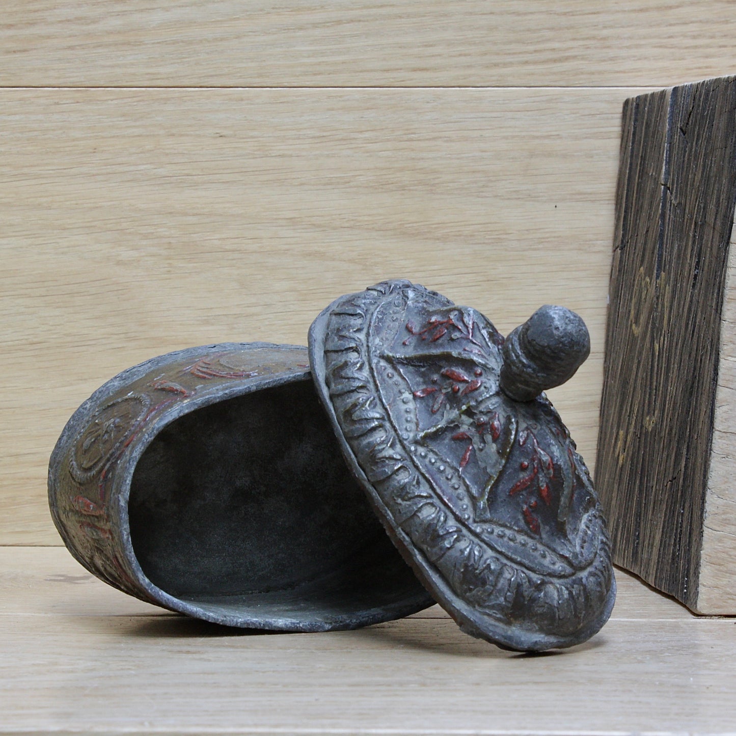 
                  
                    a highly decorated large antique Georgian tobacco box.
                  
                