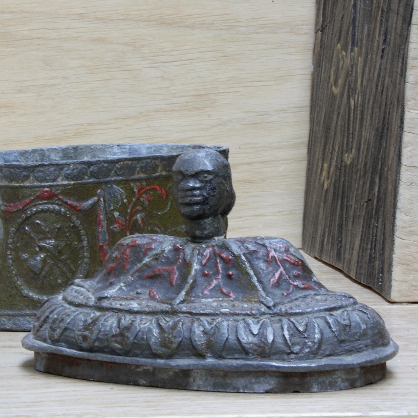 
                  
                    a highly decorated large antique Georgian tobacco box.
                  
                