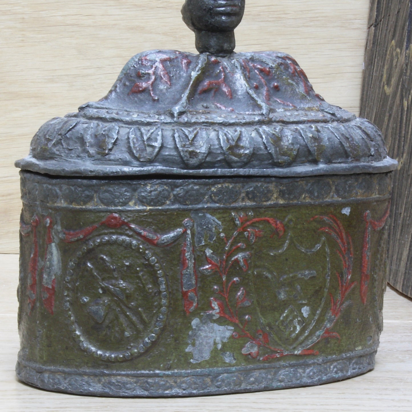 
                  
                    a highly decorated large antique Georgian tobacco box.
                  
                