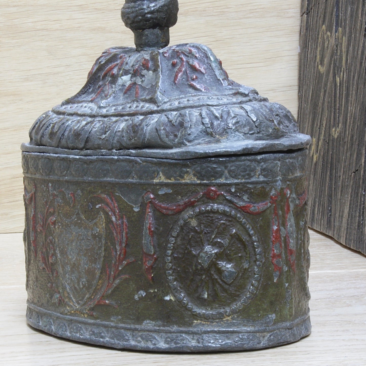 
                  
                    a highly decorated large antique Georgian tobacco box.
                  
                