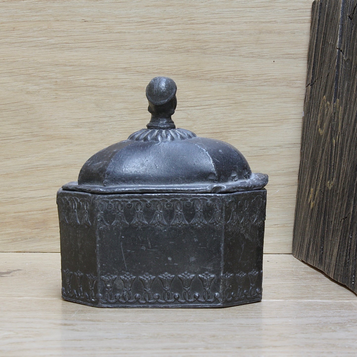 
                  
                    a modestly decorated antique Georgian tobacco box.
                  
                