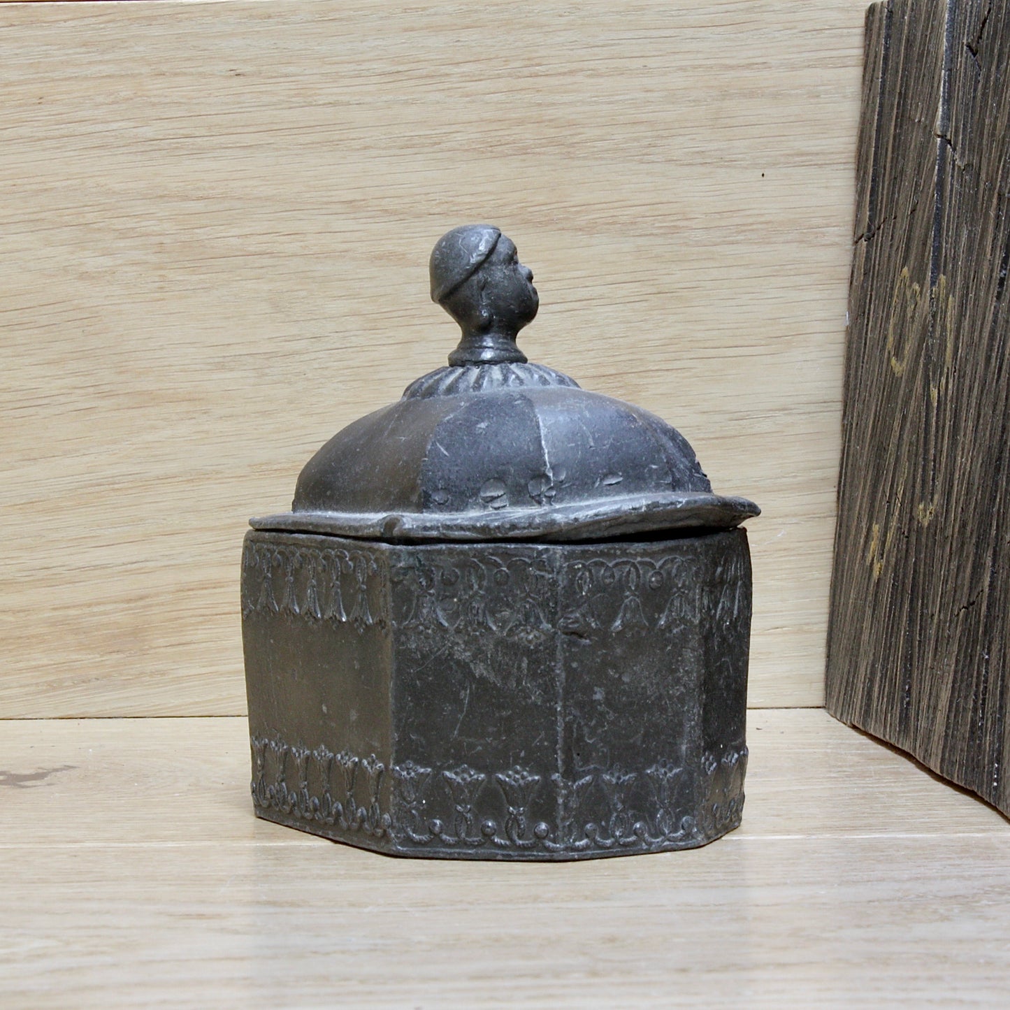 
                  
                    a modestly decorated antique Georgian tobacco box.
                  
                