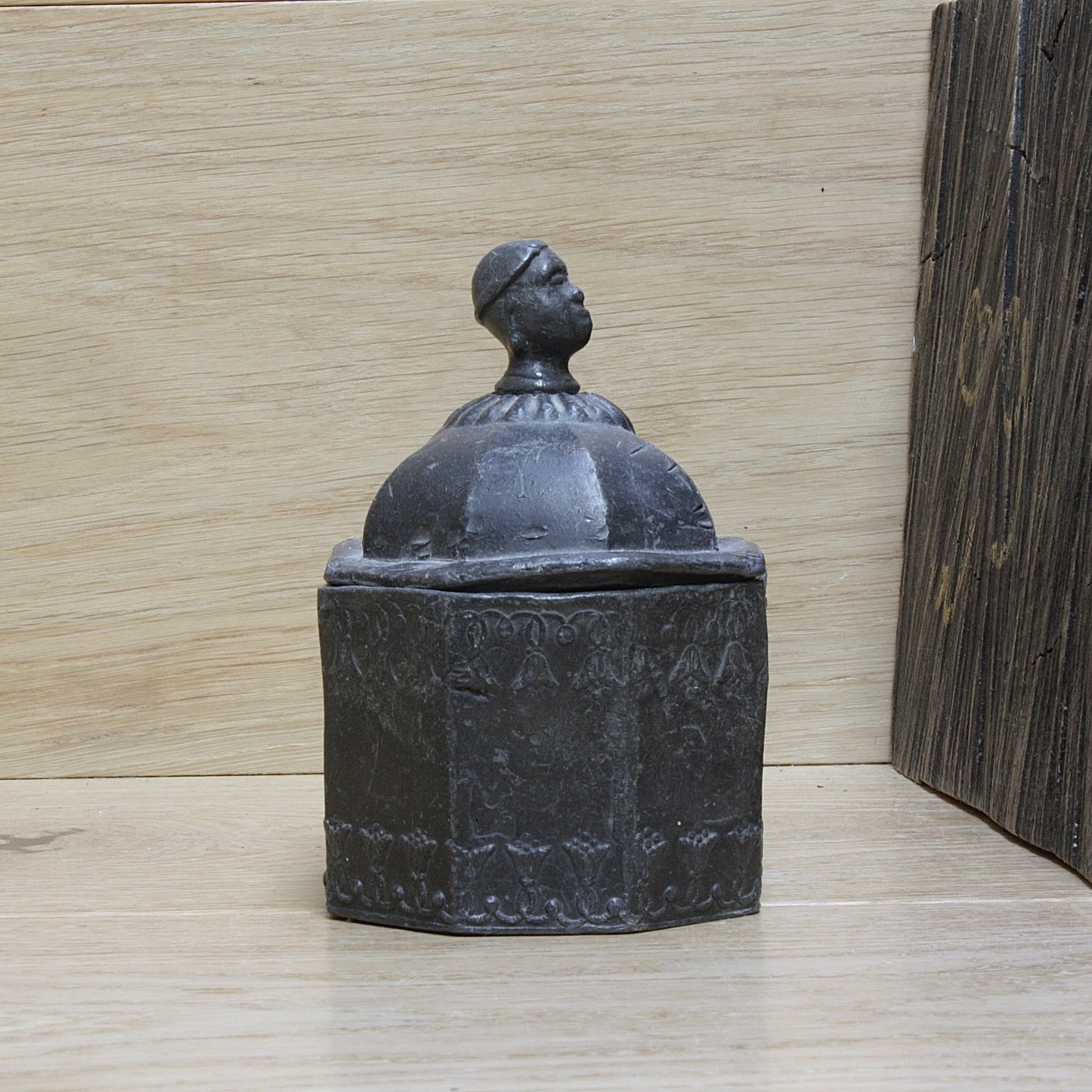 
                  
                    a modestly decorated antique Georgian tobacco box.
                  
                