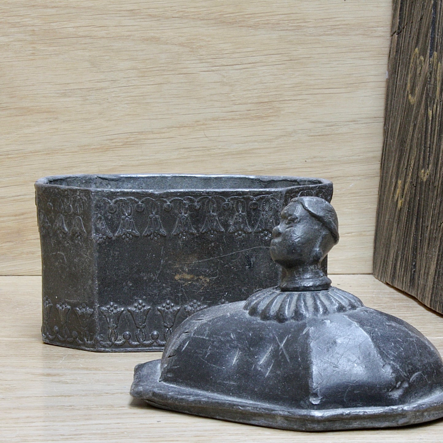 
                  
                    a modestly decorated antique Georgian tobacco box.
                  
                