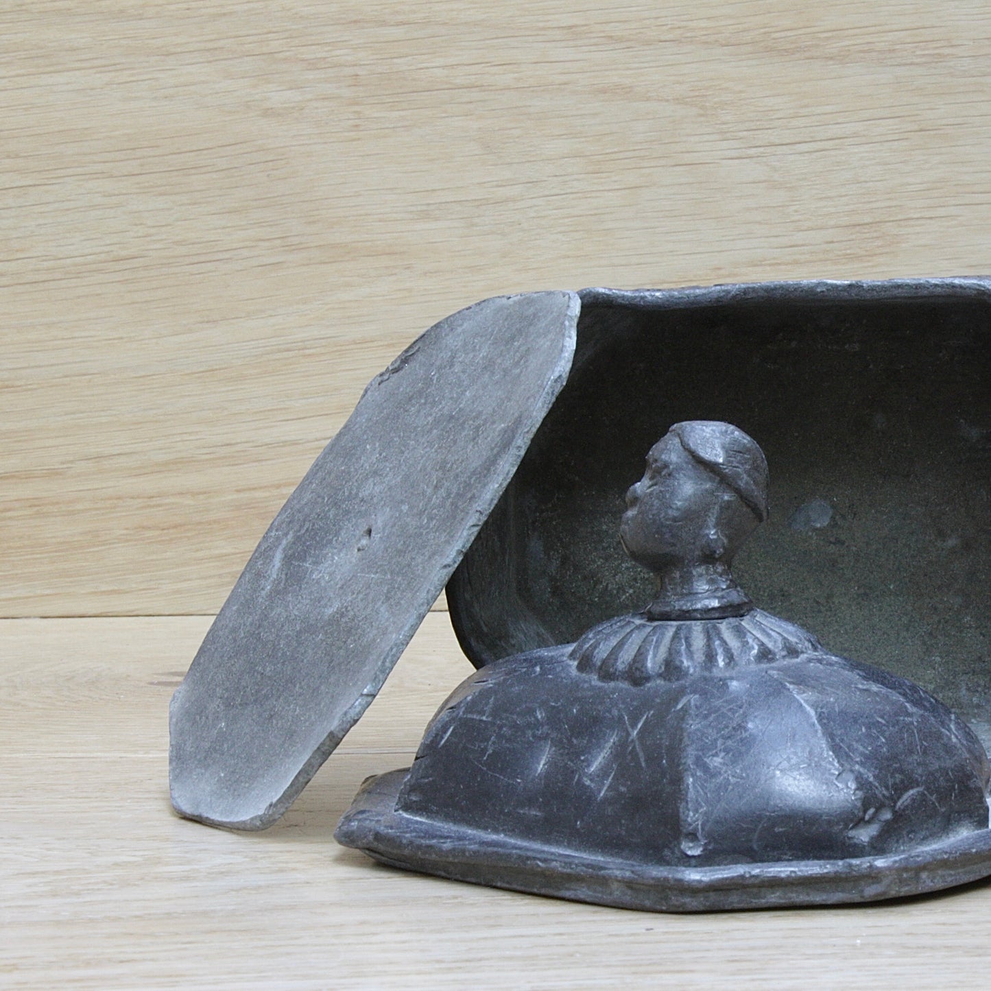 
                  
                    a modestly decorated antique Georgian tobacco box.
                  
                