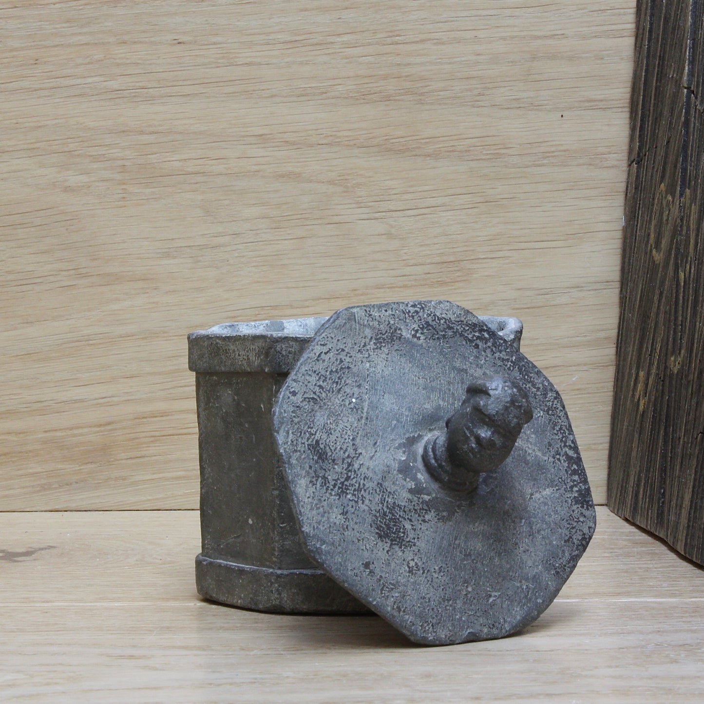 
                  
                    an early antique Georgian lead tobacco box.
                  
                
