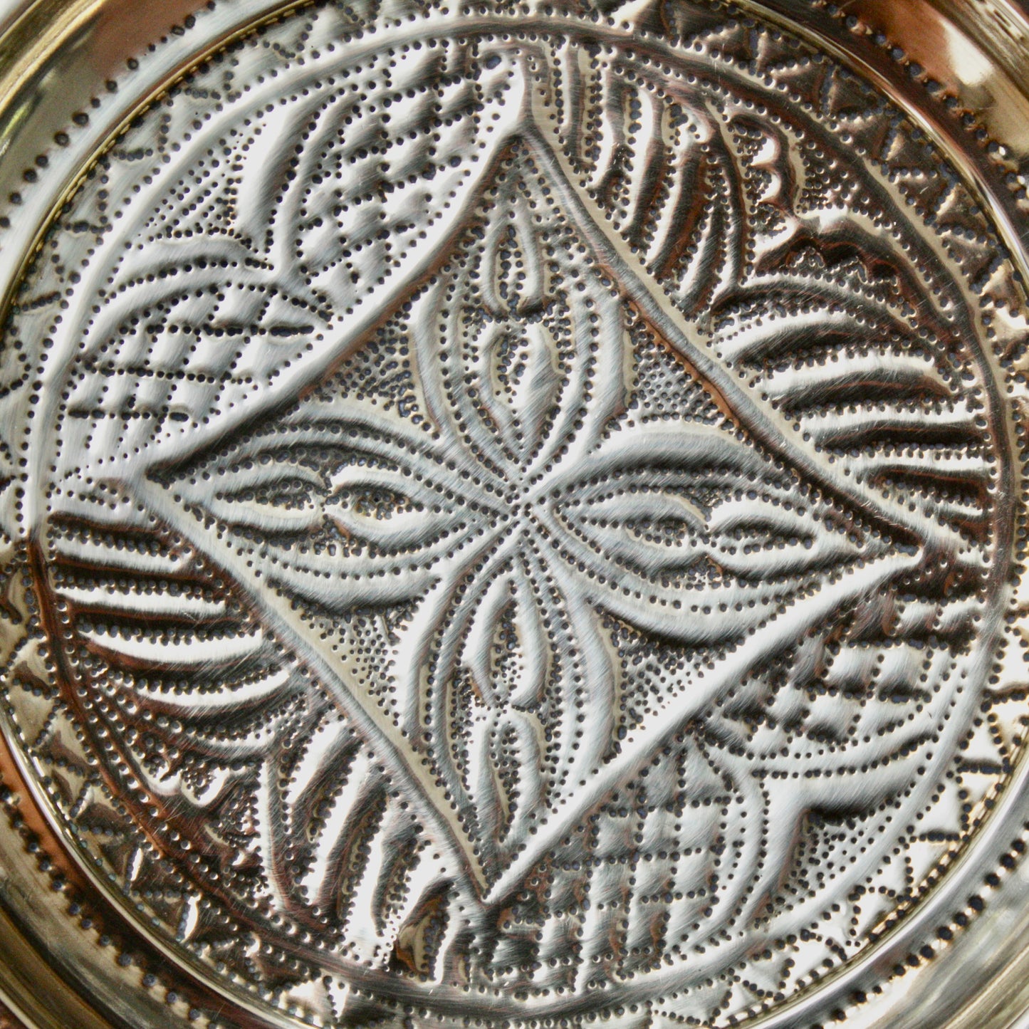 
                  
                    no.1 a small hand embossed brass dish from old calabar.
                  
                
