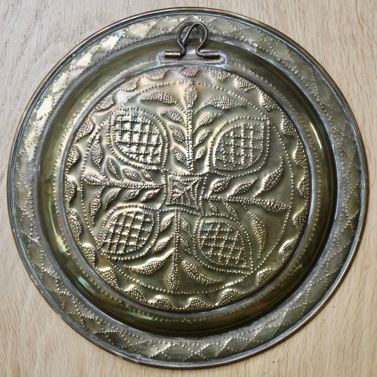
                  
                    no.2 a small hand embossed brass dish from old calabar.
                  
                