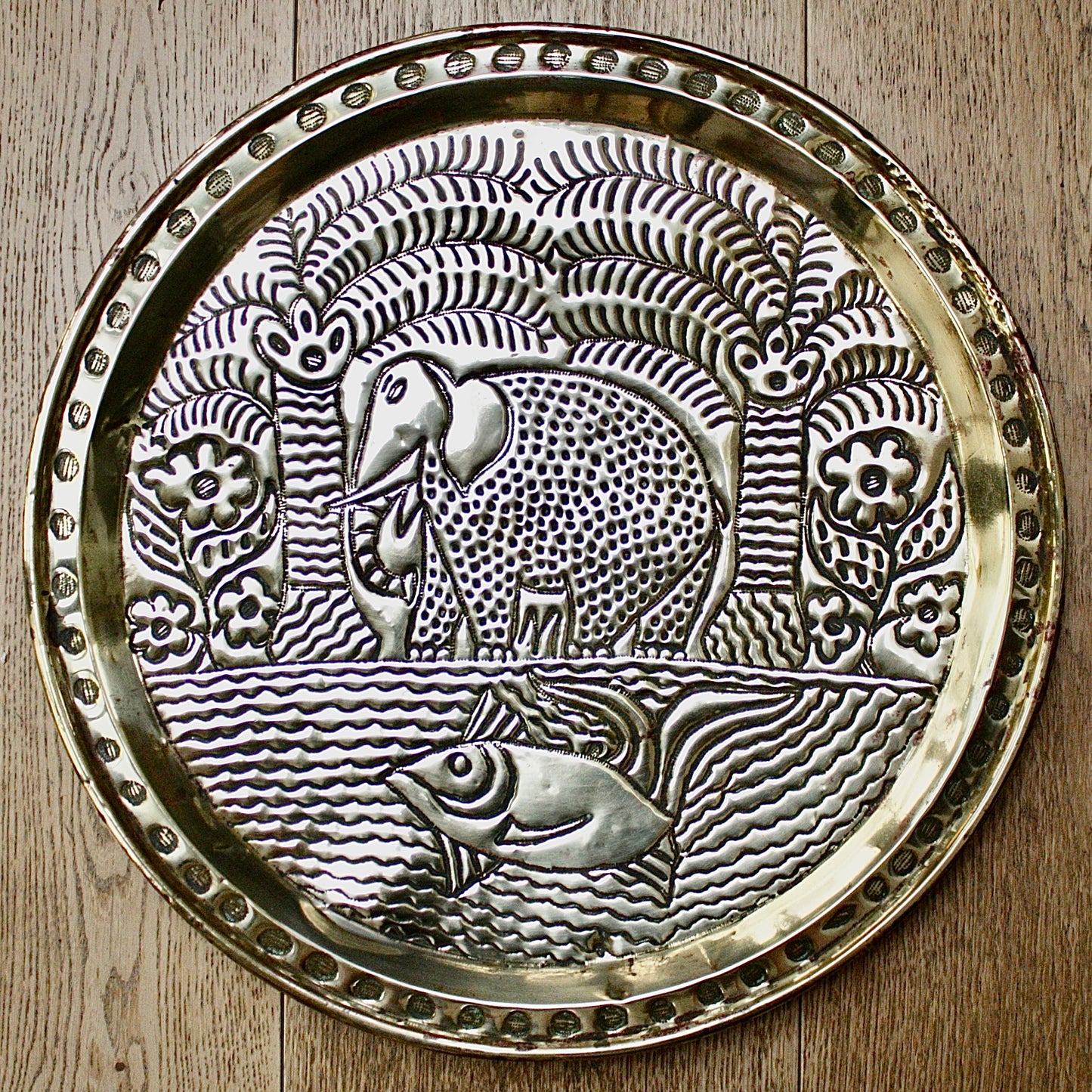 
                  
                    a. large brass efic charger. depicting calabar wildlife
                  
                