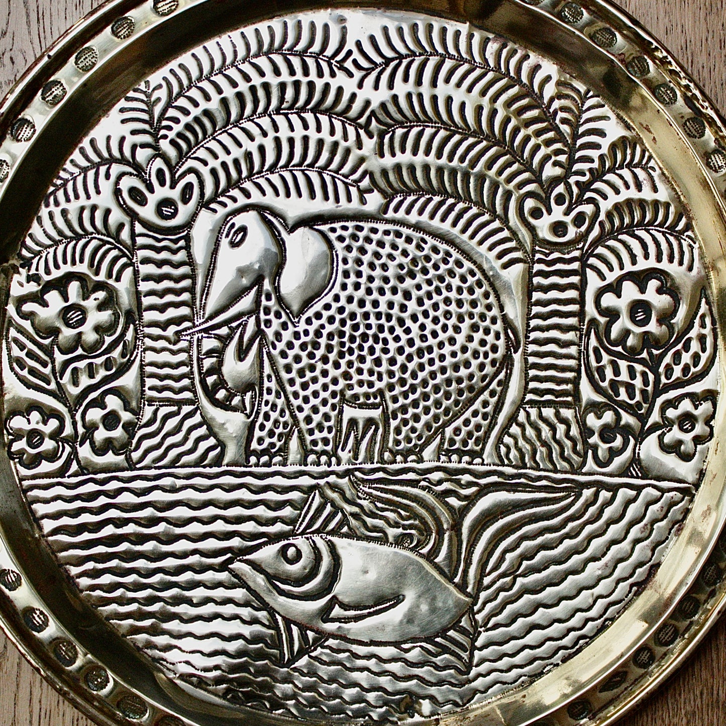 
                  
                    a. large brass efic charger. depicting calabar wildlife
                  
                