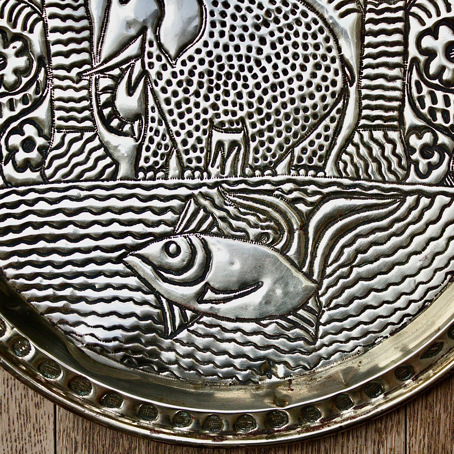 
                  
                    a. large brass efic charger. depicting calabar wildlife
                  
                
