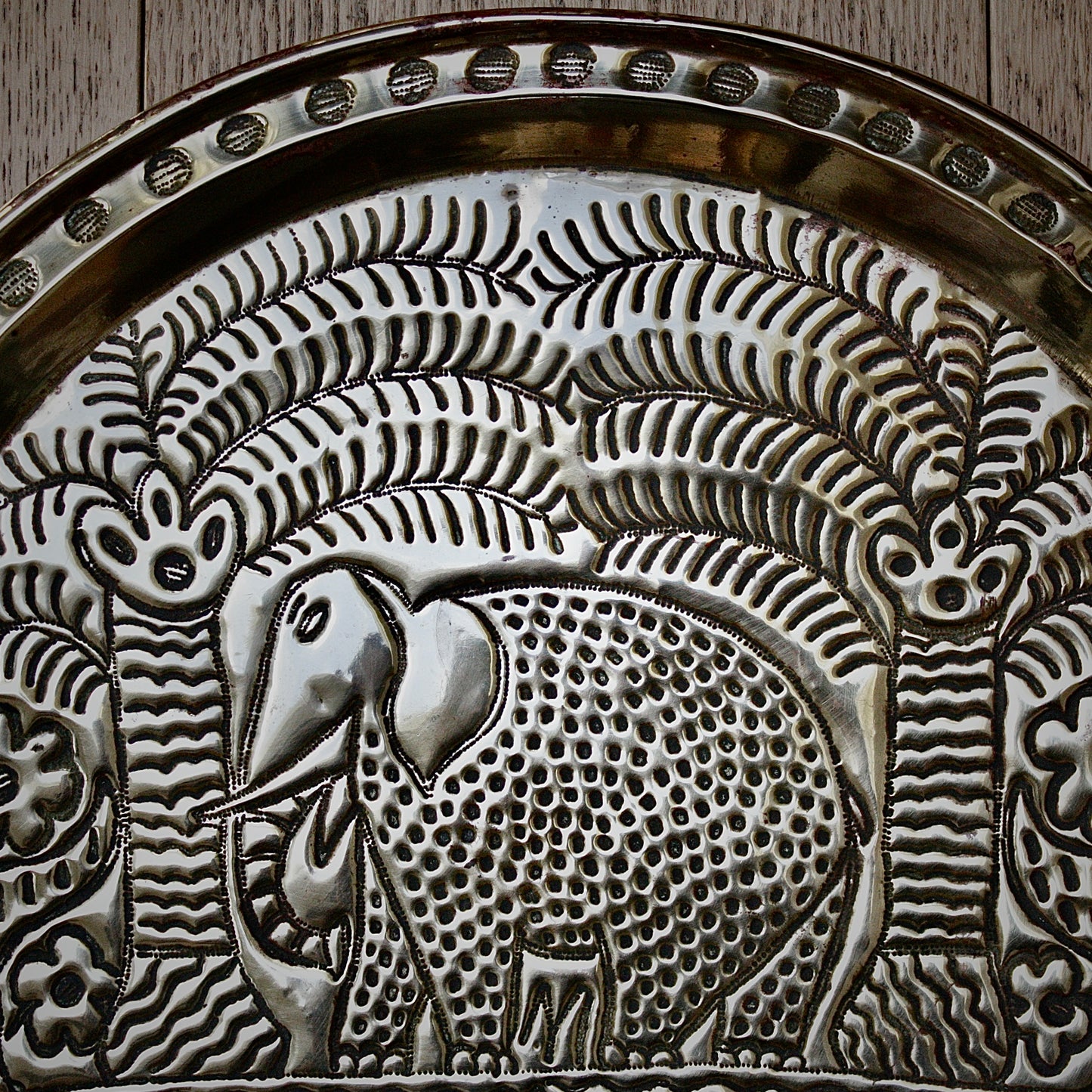 
                  
                    a. large brass efic charger. depicting calabar wildlife
                  
                