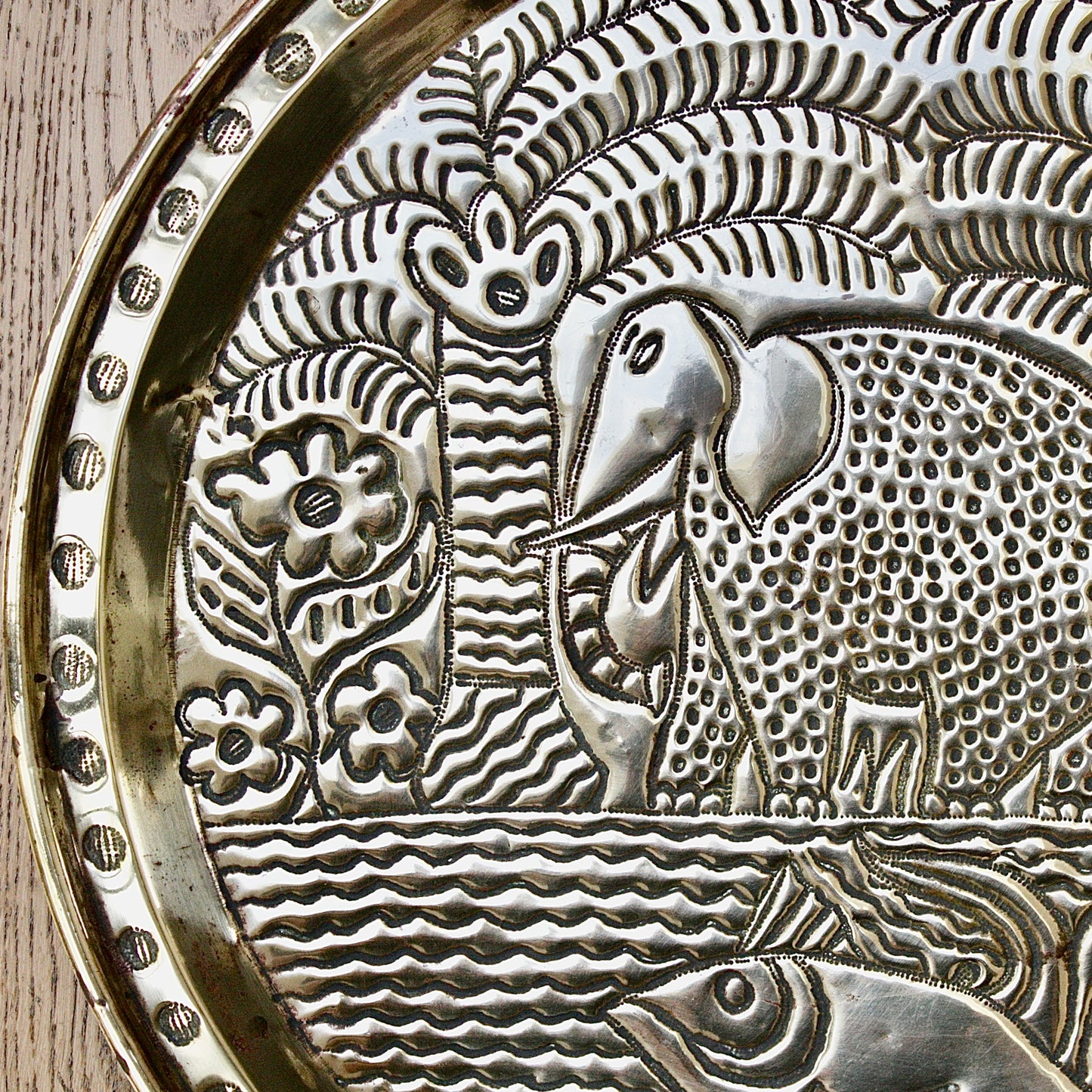 
                  
                    a. large brass efic charger. depicting calabar wildlife
                  
                