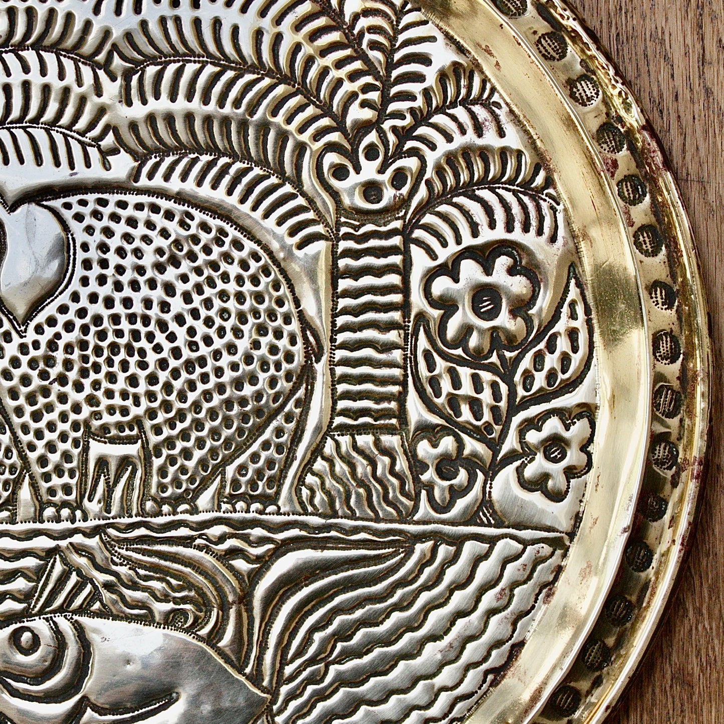 
                  
                    a. large brass efic charger. depicting calabar wildlife
                  
                