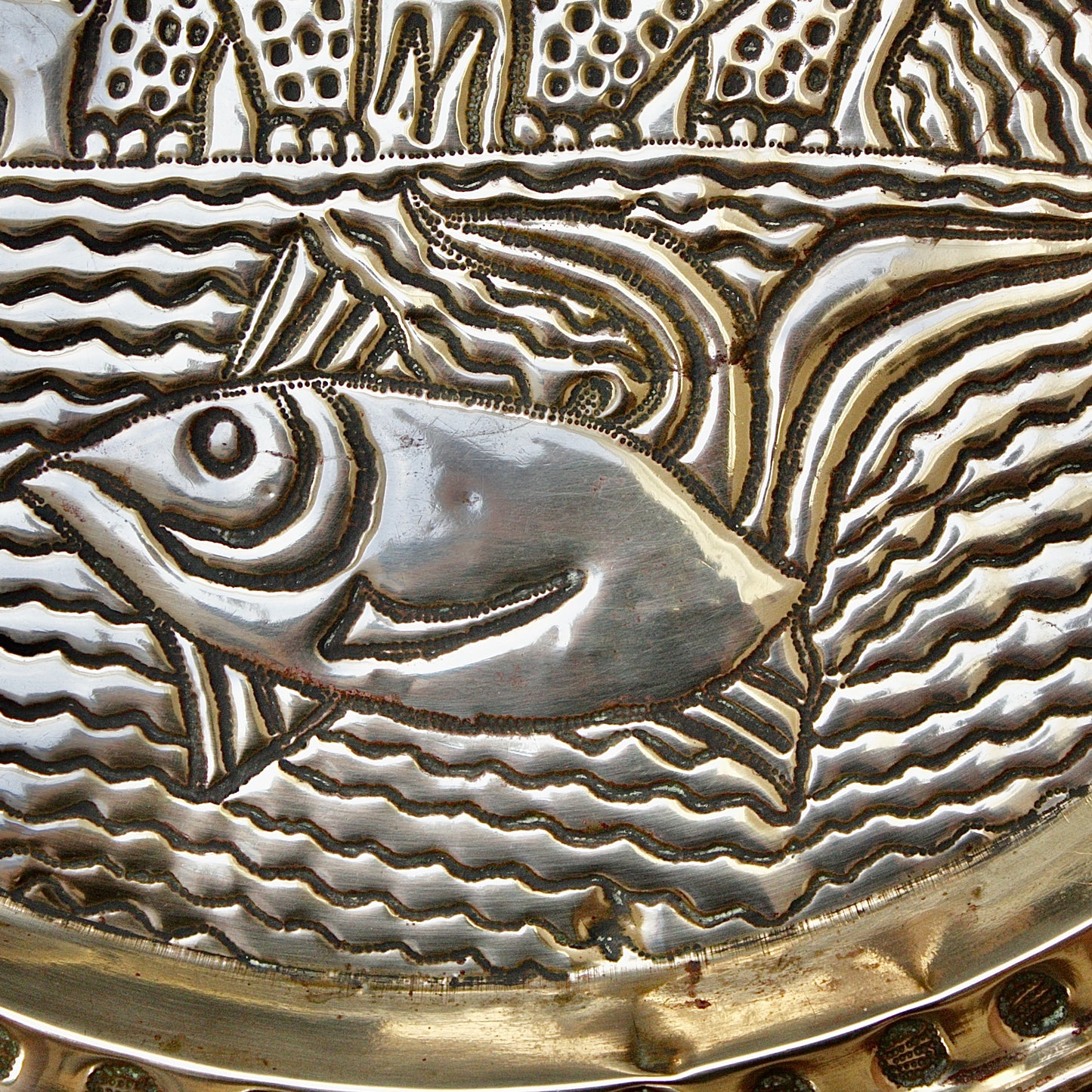 
                  
                    a. large brass efic charger. depicting calabar wildlife
                  
                