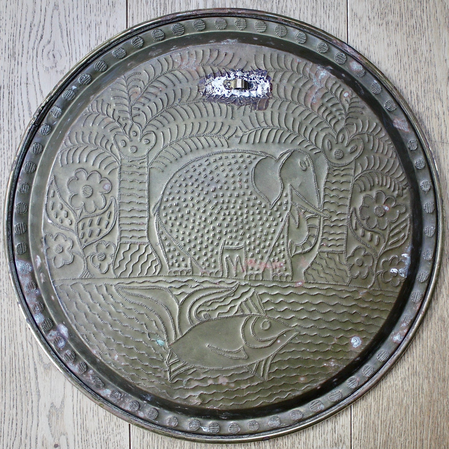
                  
                    a. large brass efic charger. depicting calabar wildlife
                  
                