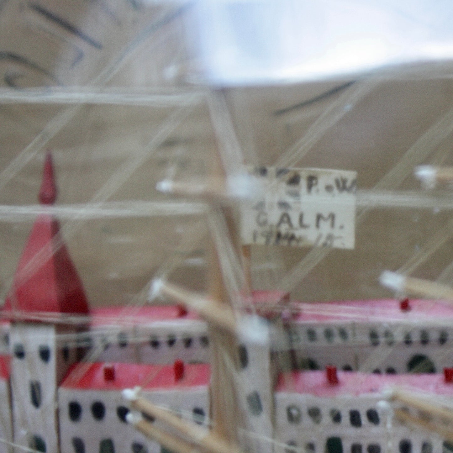 
                  
                    a highly detailed ship in a bottle dated 1914-15
                  
                