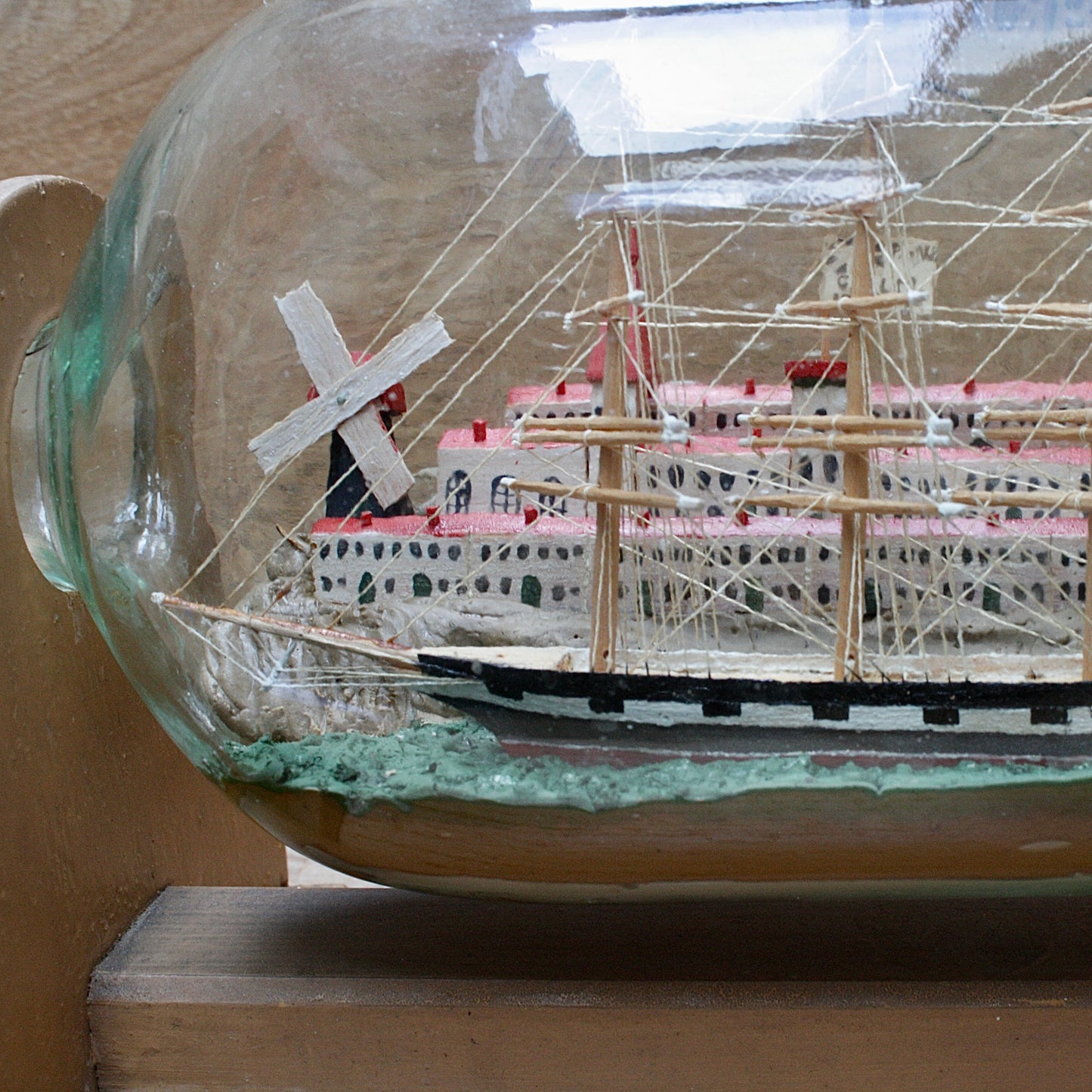 
                  
                    a highly detailed ship in a bottle dated 1914-15
                  
                