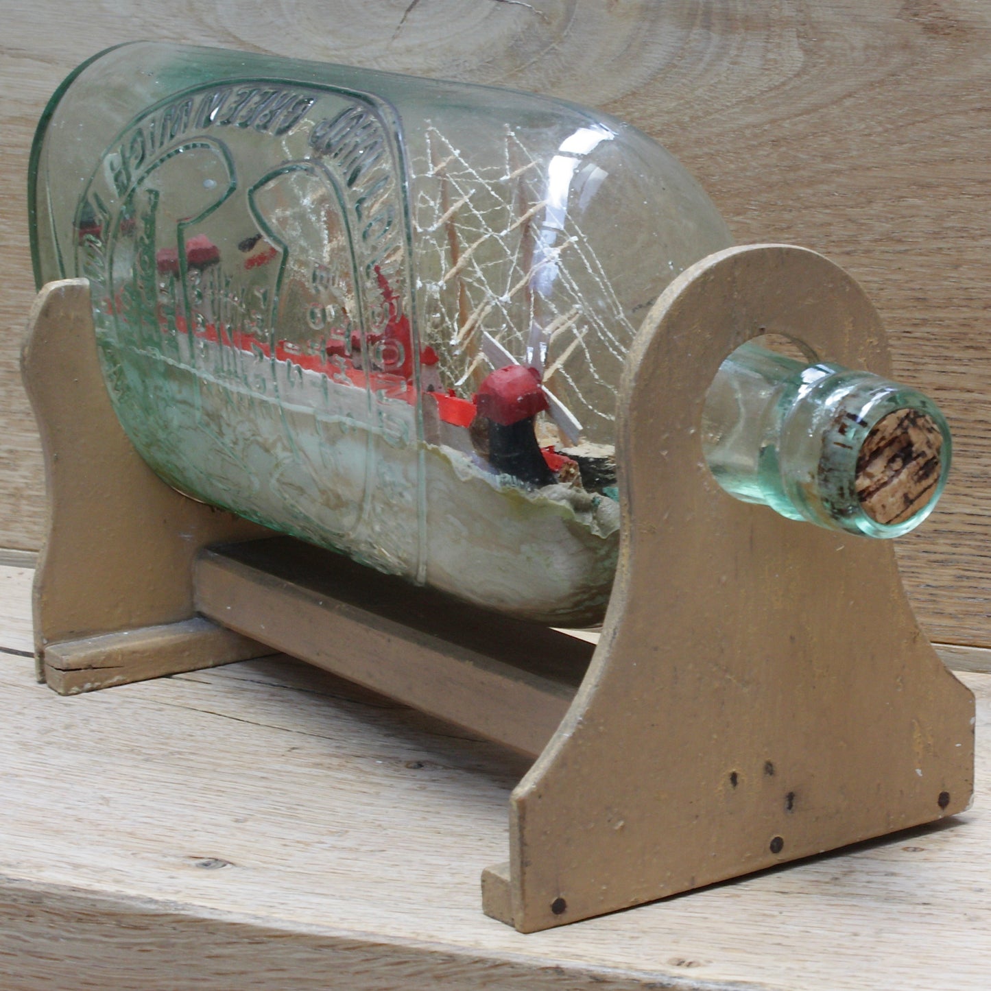 
                  
                    a highly detailed ship in a bottle dated 1914-15
                  
                