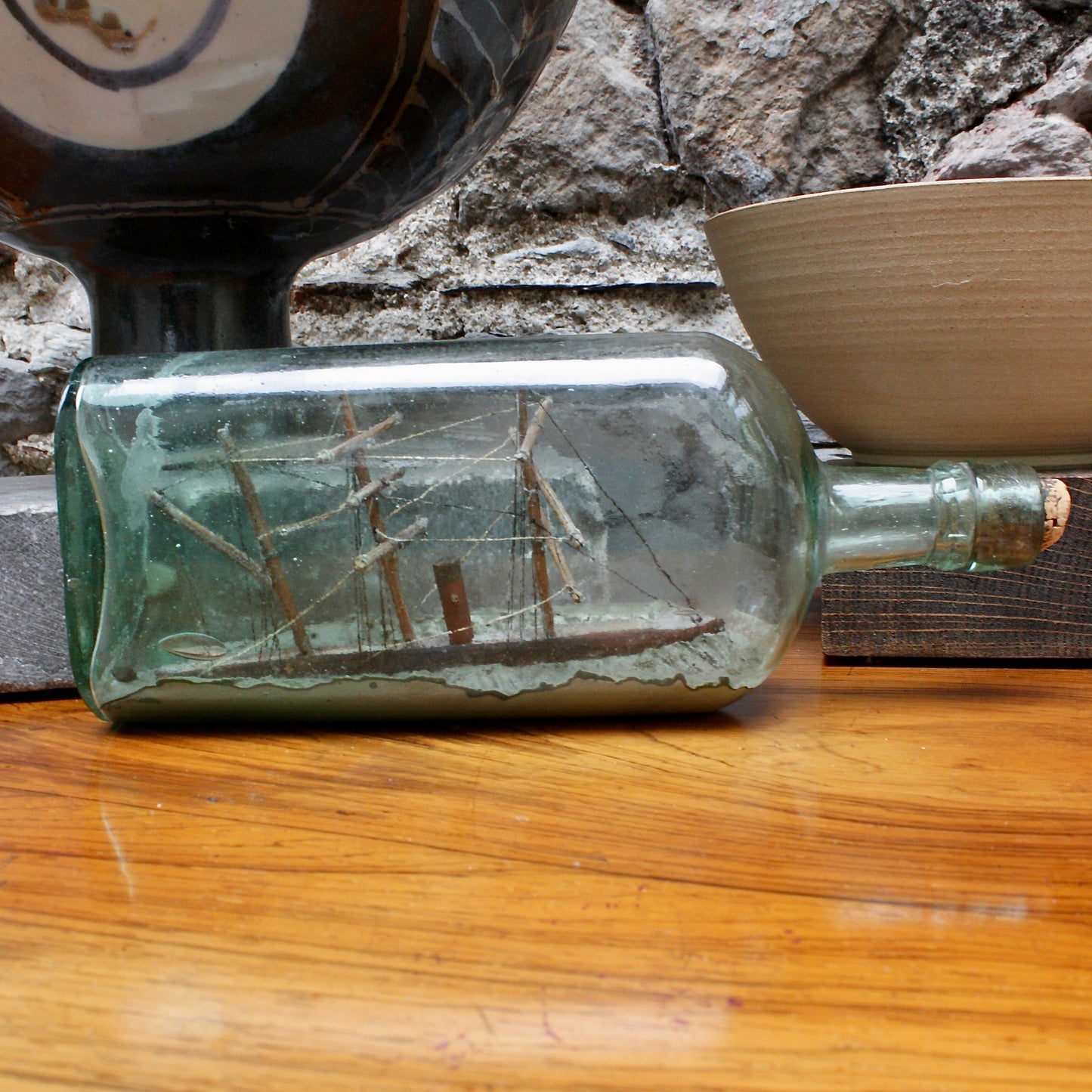 
                  
                    a 19th century ship in a bottle.
                  
                
