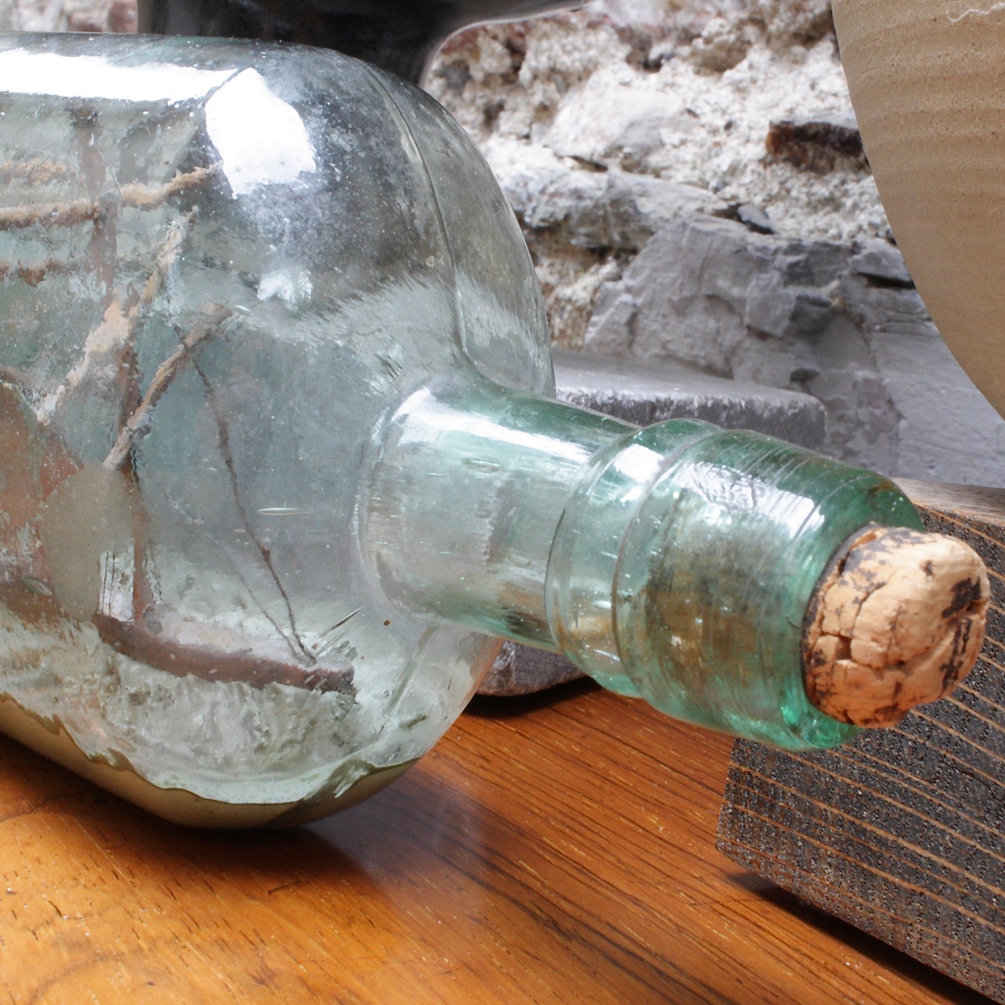 
                  
                    a 19th century ship in a bottle.
                  
                