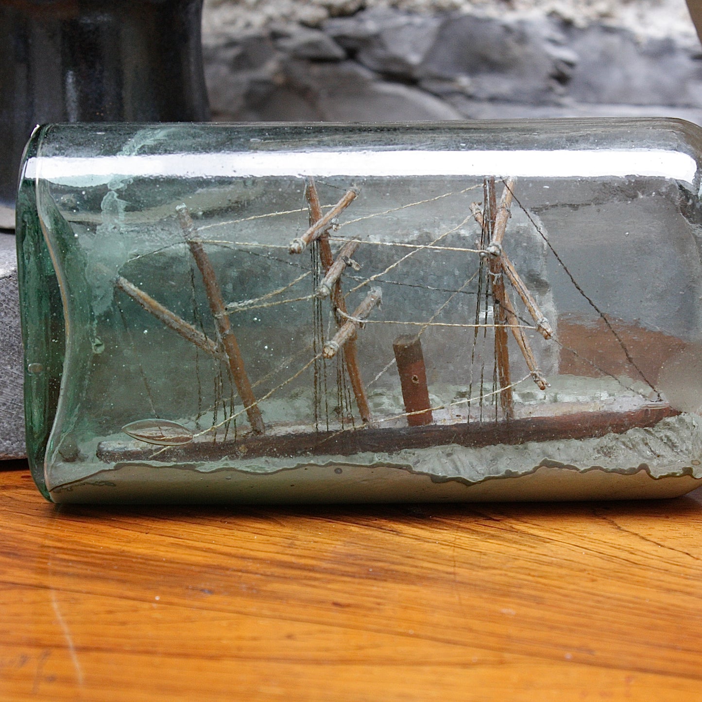 
                  
                    a 19th century ship in a bottle.
                  
                