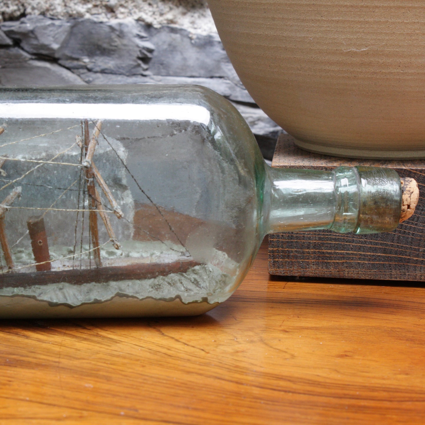 
                  
                    a 19th century ship in a bottle.
                  
                