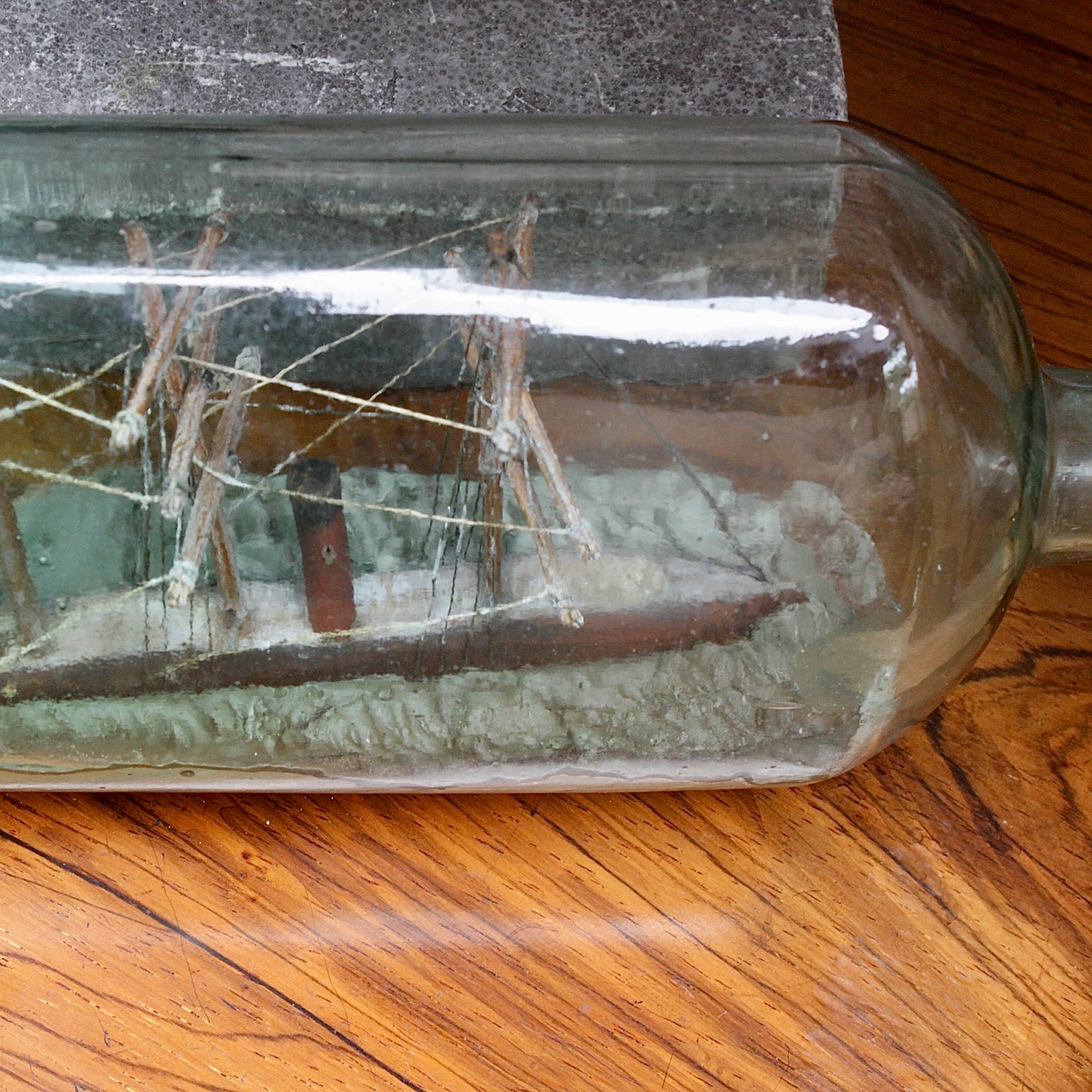 
                  
                    a 19th century ship in a bottle.
                  
                