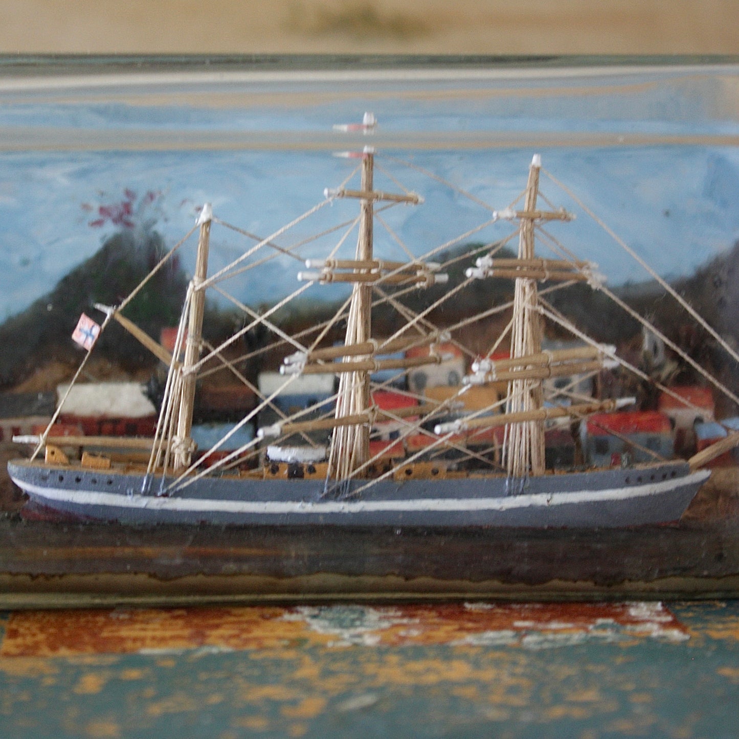 
                  
                    a ship in a bottle with volcano.
                  
                