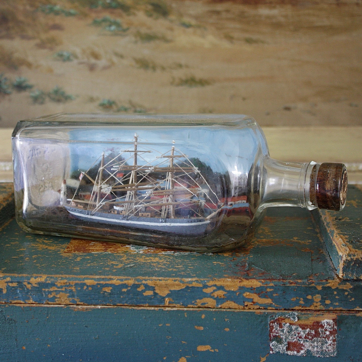 
                  
                    a ship in a bottle with volcano.
                  
                