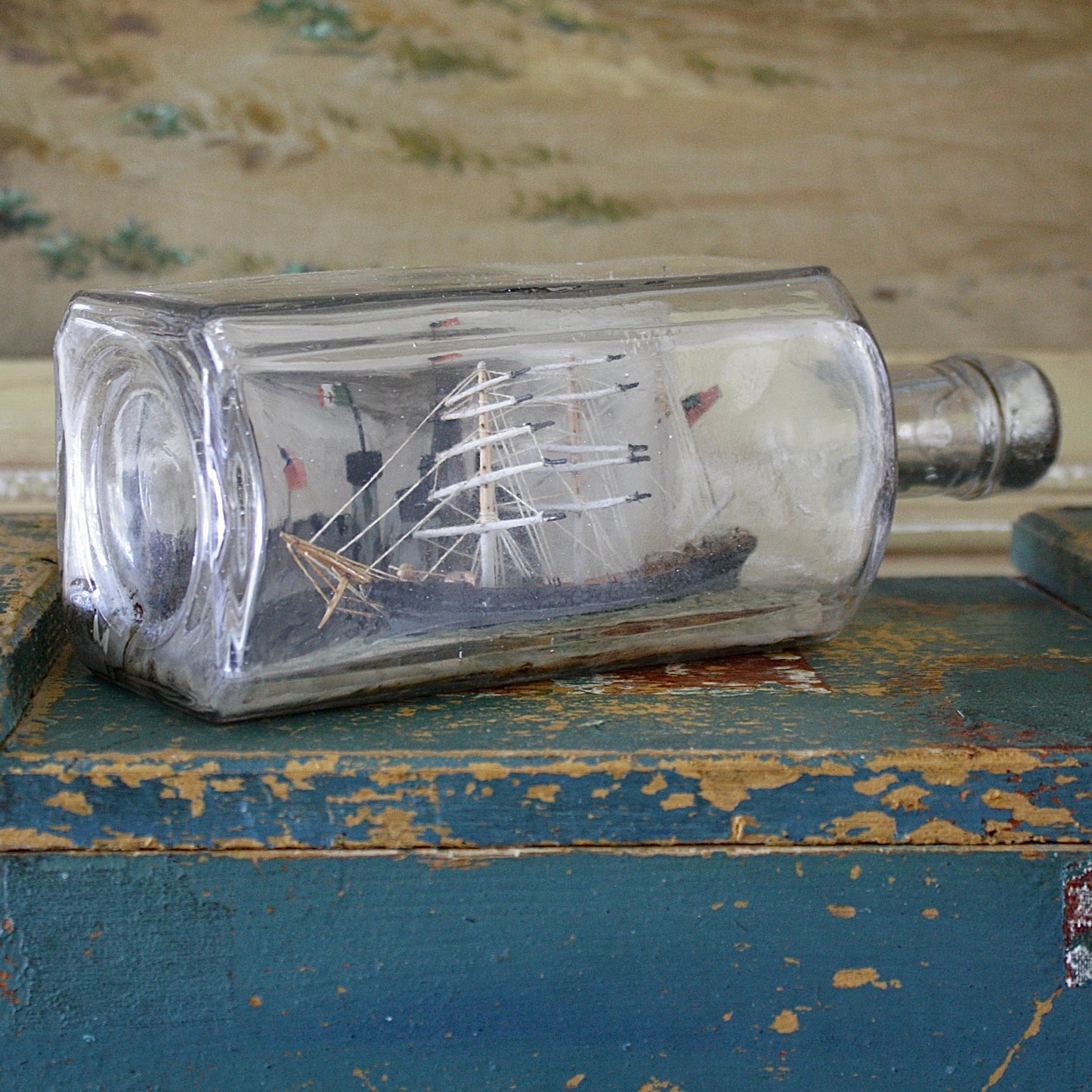 
                  
                    a ship in a bottle with volcano.
                  
                