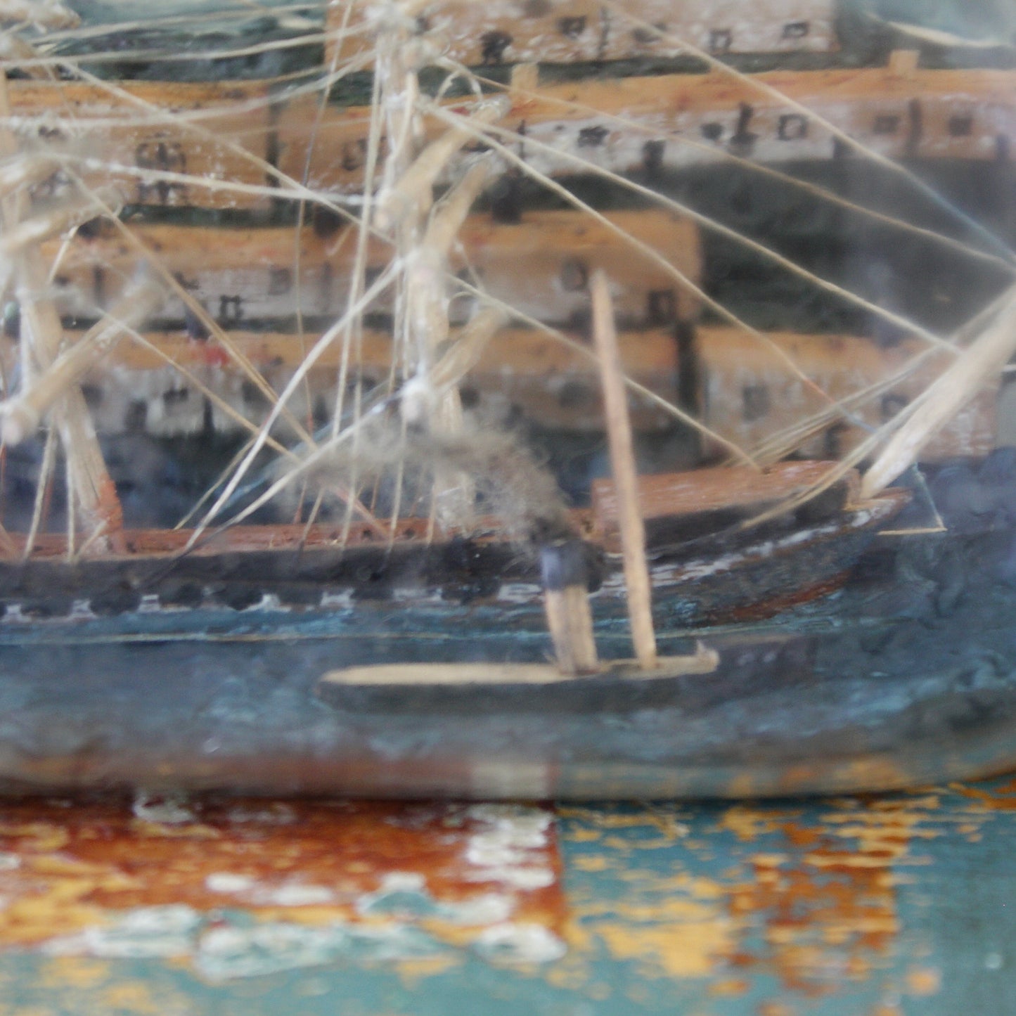 
                  
                    a ship in a walkers whisky bottle,
                  
                