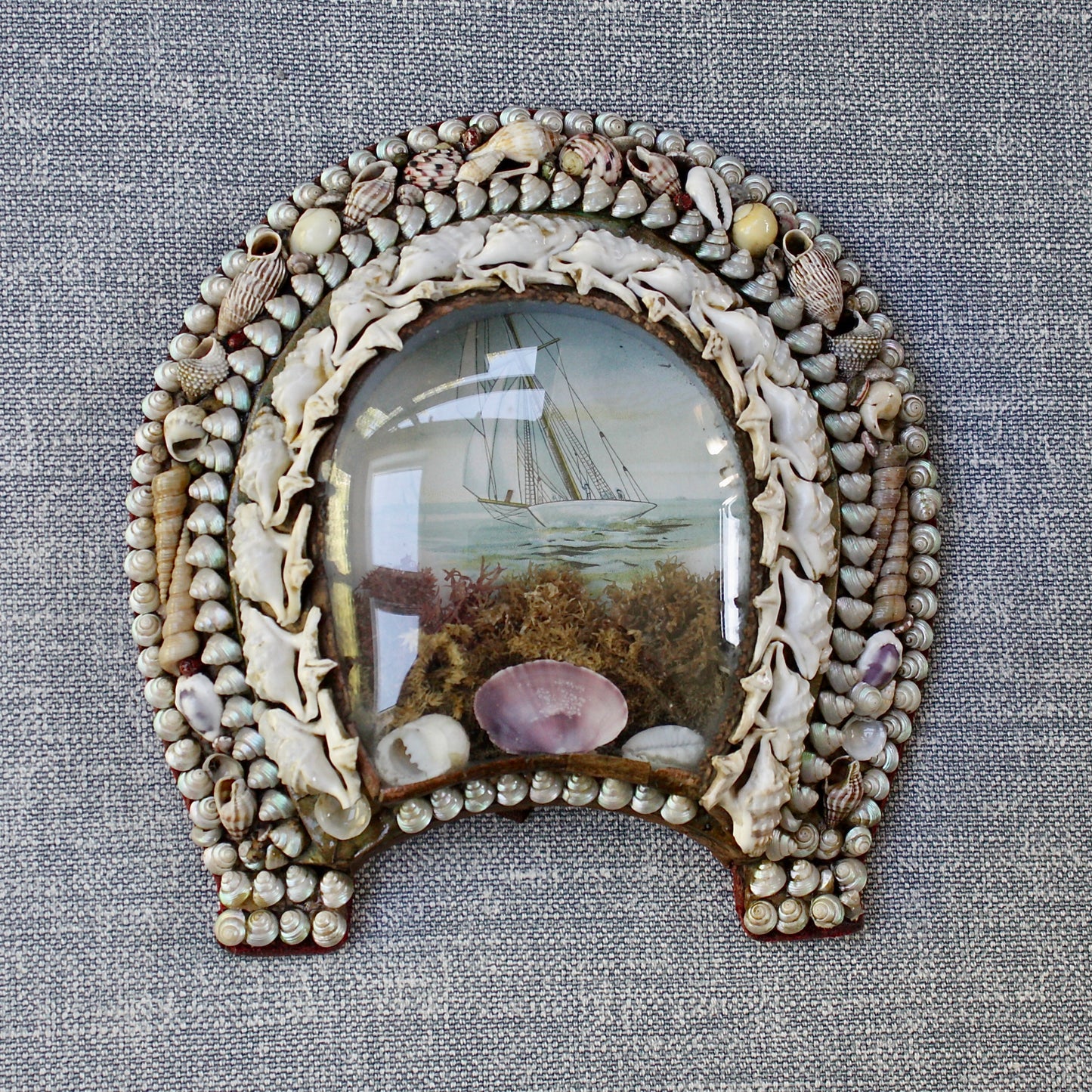 
                  
                    an antique victorian keep sake love token, shell sailors valentine lucky horseshoe.
                  
                