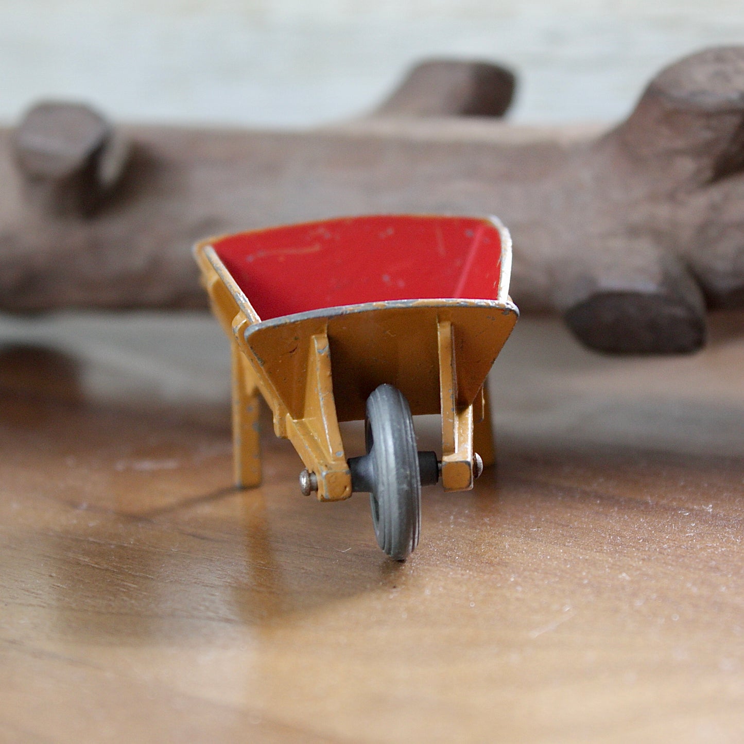 
                  
                    a miniature wheelbarrow.
                  
                