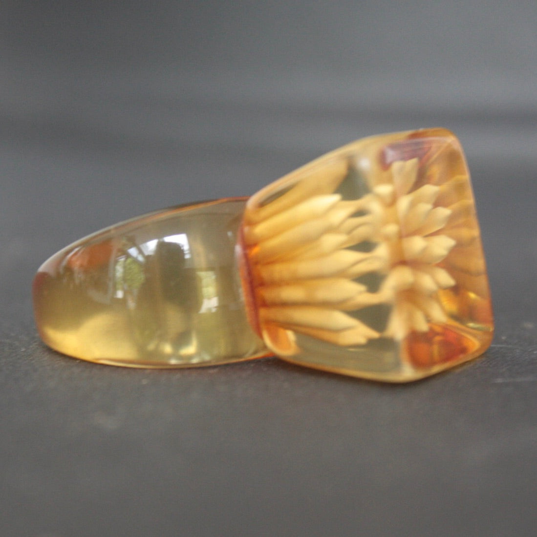 
                  
                    ring of amber perspex
                  
                