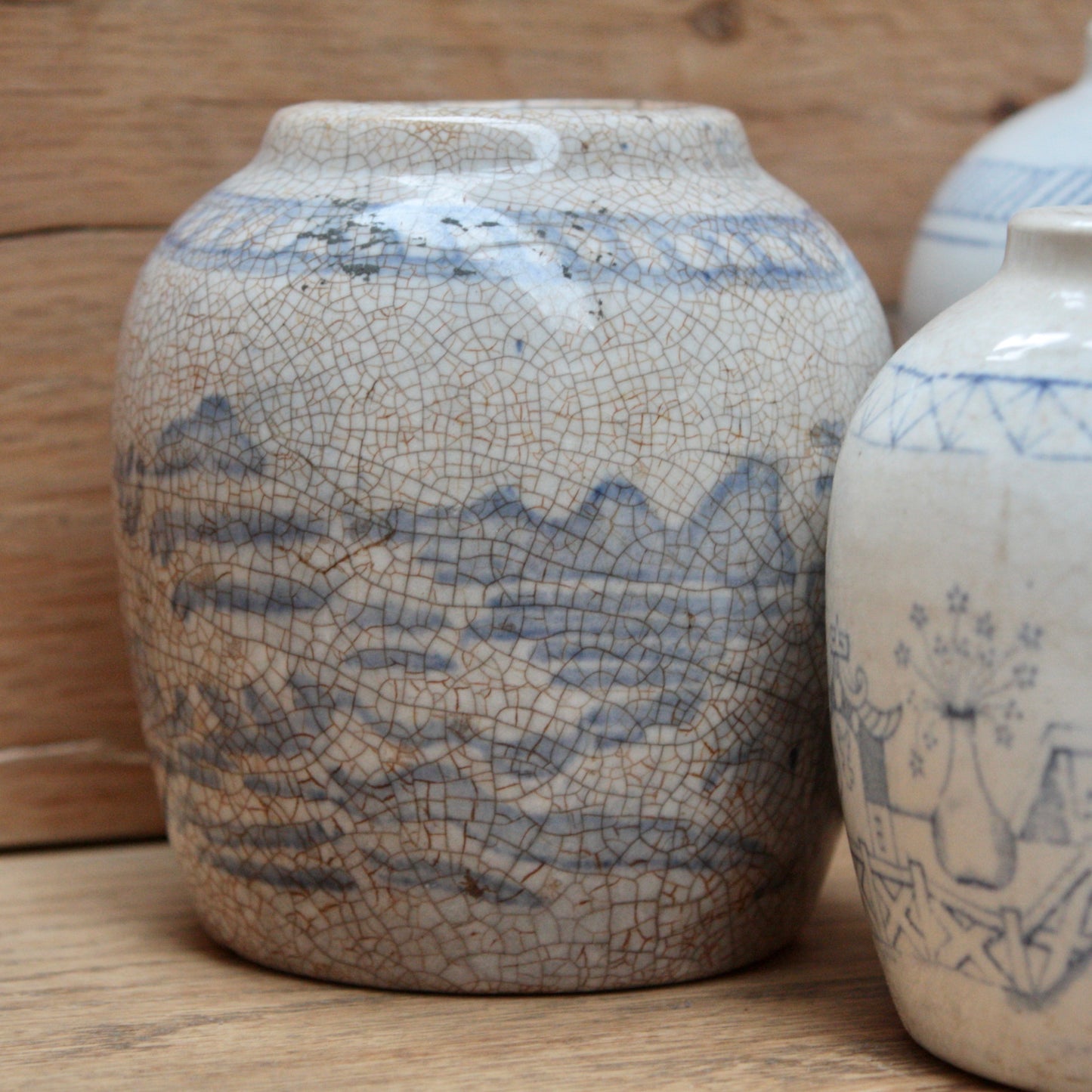 
                  
                    transfer blue patterned 19th century qing dynasty stoneware ginger jars.
                  
                