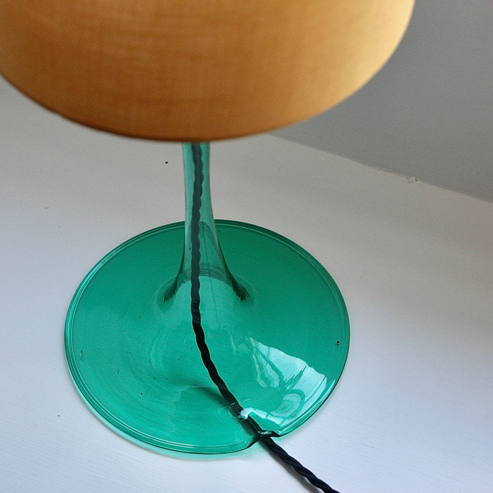 
                  
                    emerald green glass lamps, a pair
                  
                