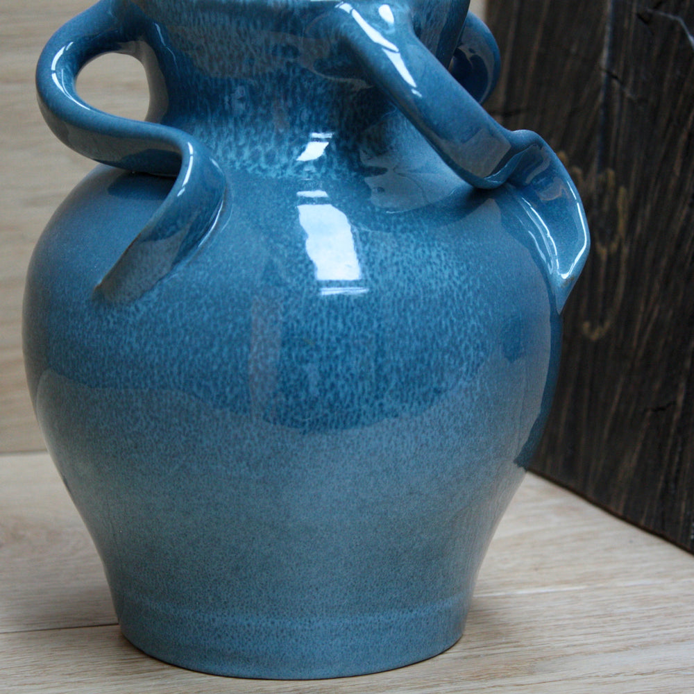 
                  
                    magnificent lakes pottery medusa vase
                  
                