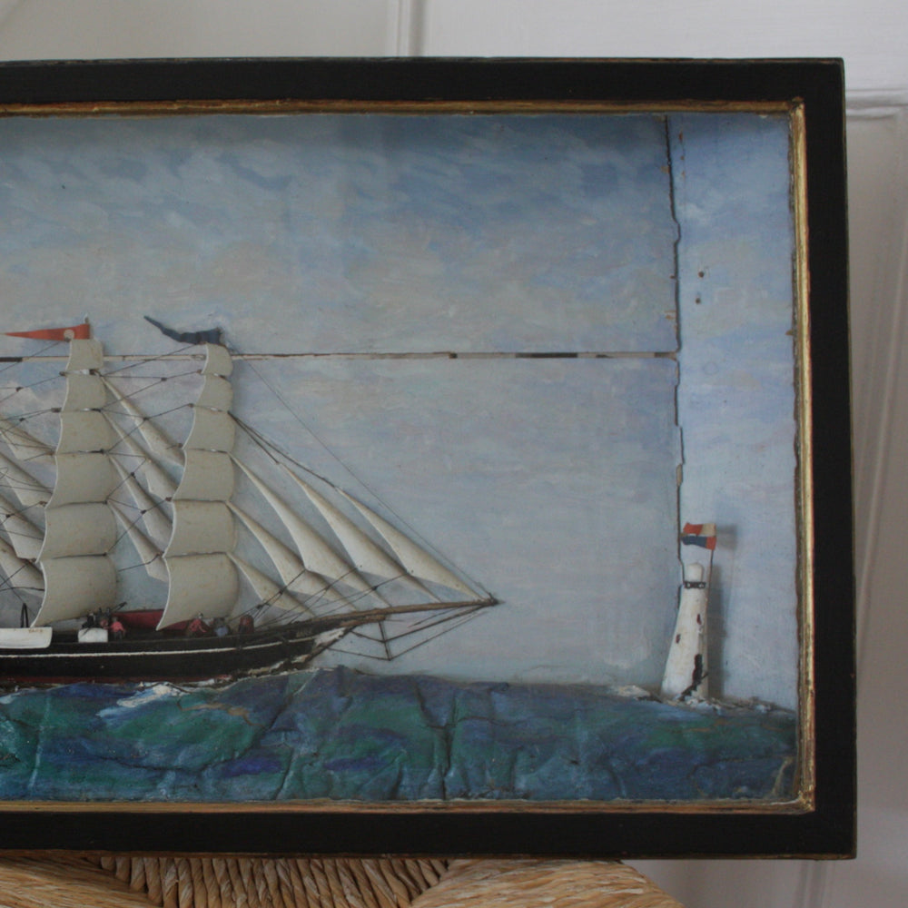 
                  
                    an antique folk art sailor made diorama or shadowbox
                  
                