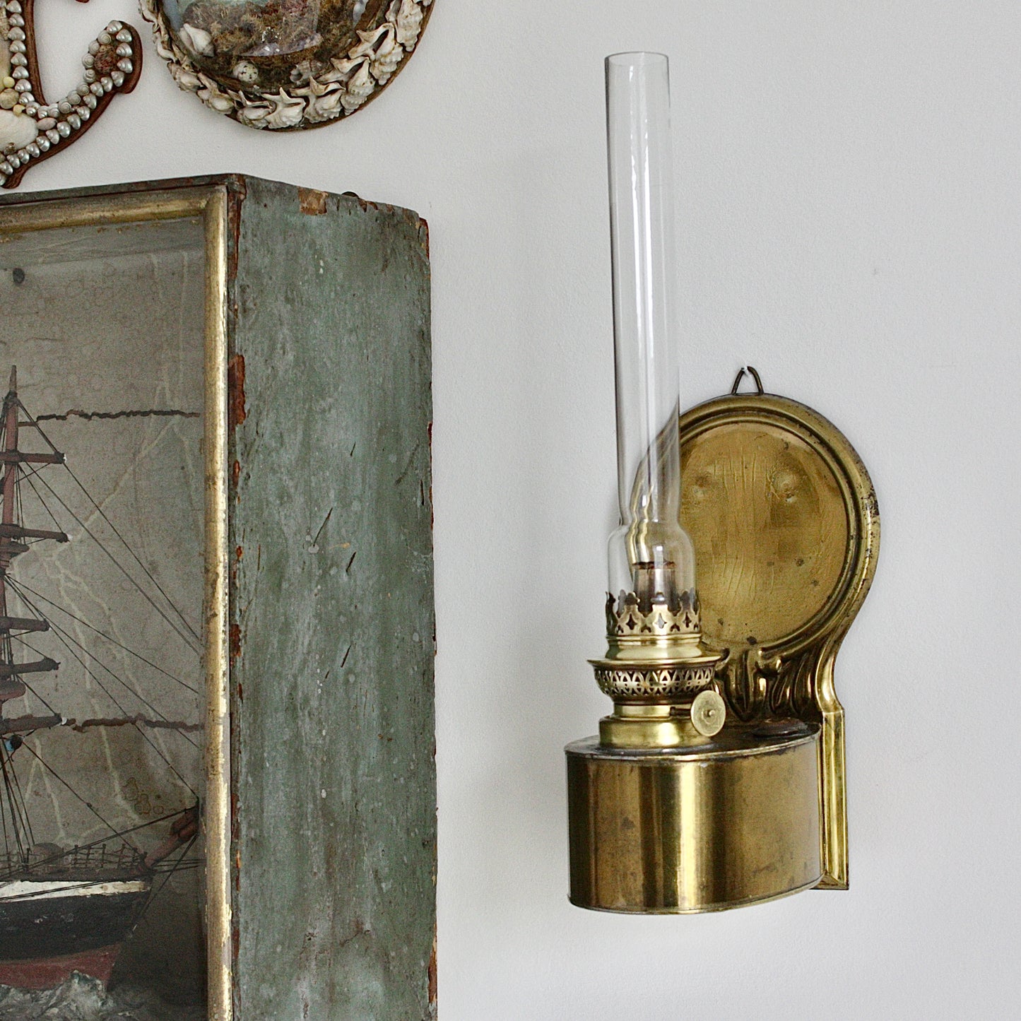 
                  
                    a victorian brass plated tin storm paraffin lamp
                  
                