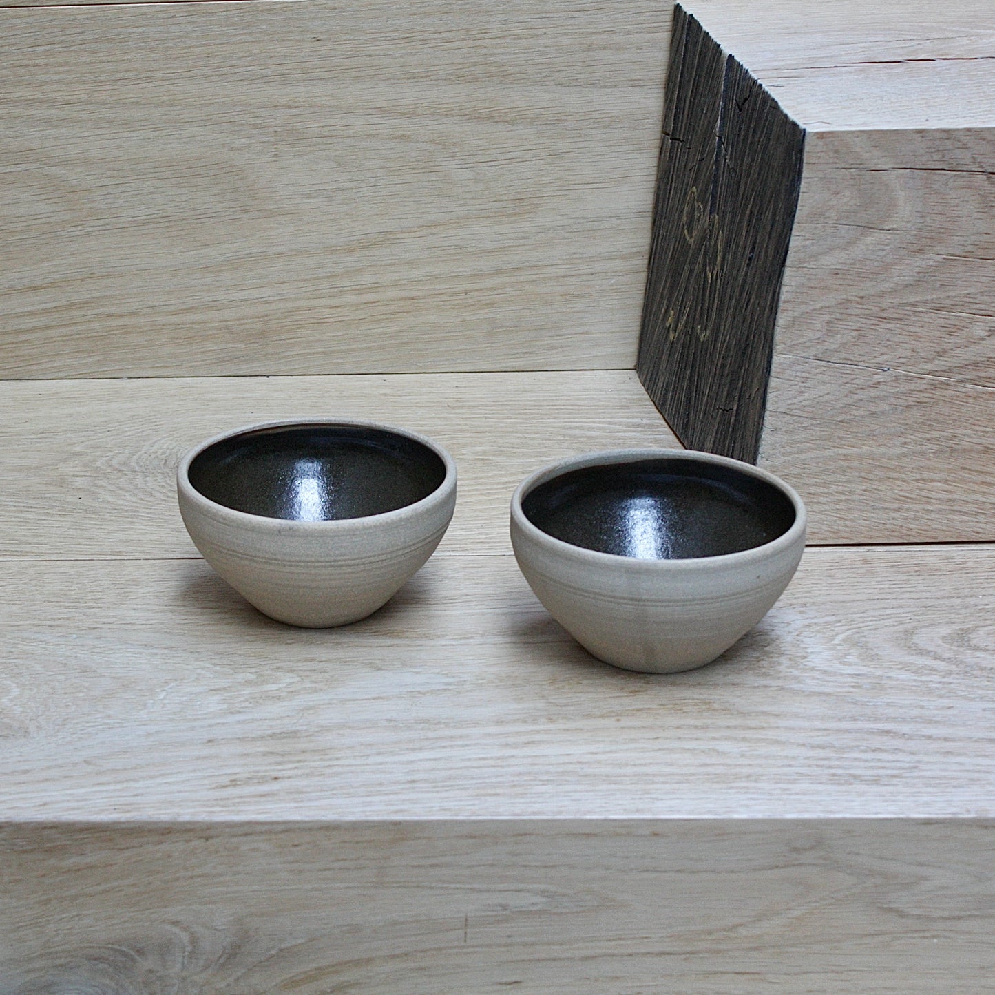 
                  
                    a pair of studio pottery bowls by alan brough.
                  
                