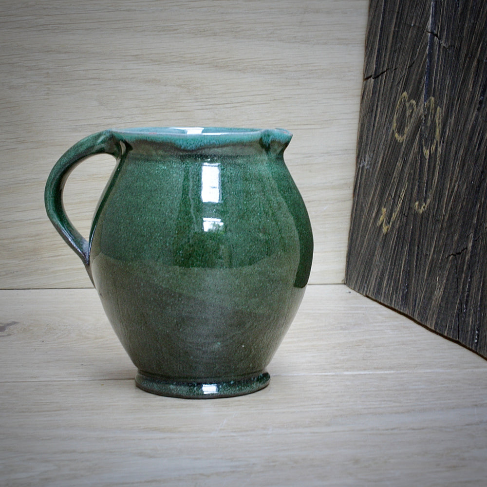 a lakes Cornish pottery Truro green jug.