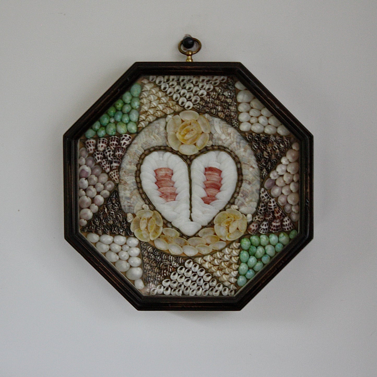 
                  
                    a late 20th century shell mosaic, sailors valentine.
                  
                