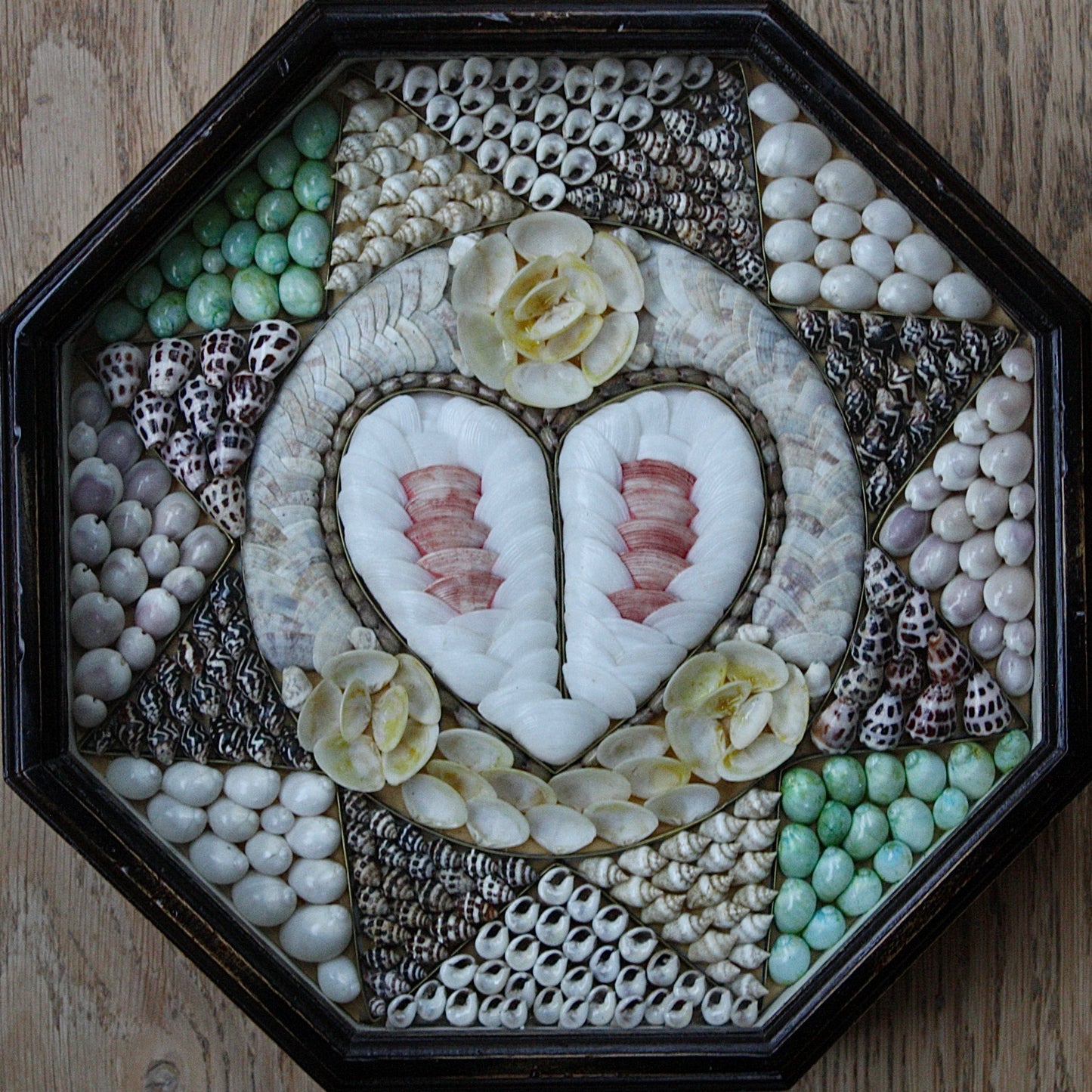 
                  
                    a late 20th century shell mosaic, sailors valentine.
                  
                