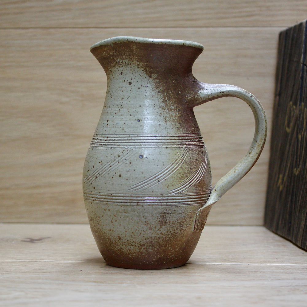 a studio pottery salt gaze jug.